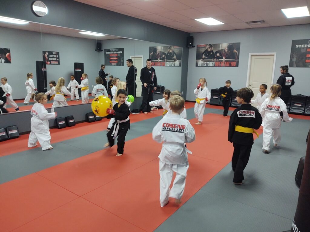 Two children practicing martial arts together in Bad Axe